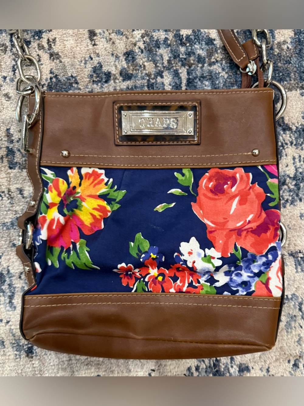 CHAPS Floral Chained Crossbody Bag featuring a vibrant red and yellow floral